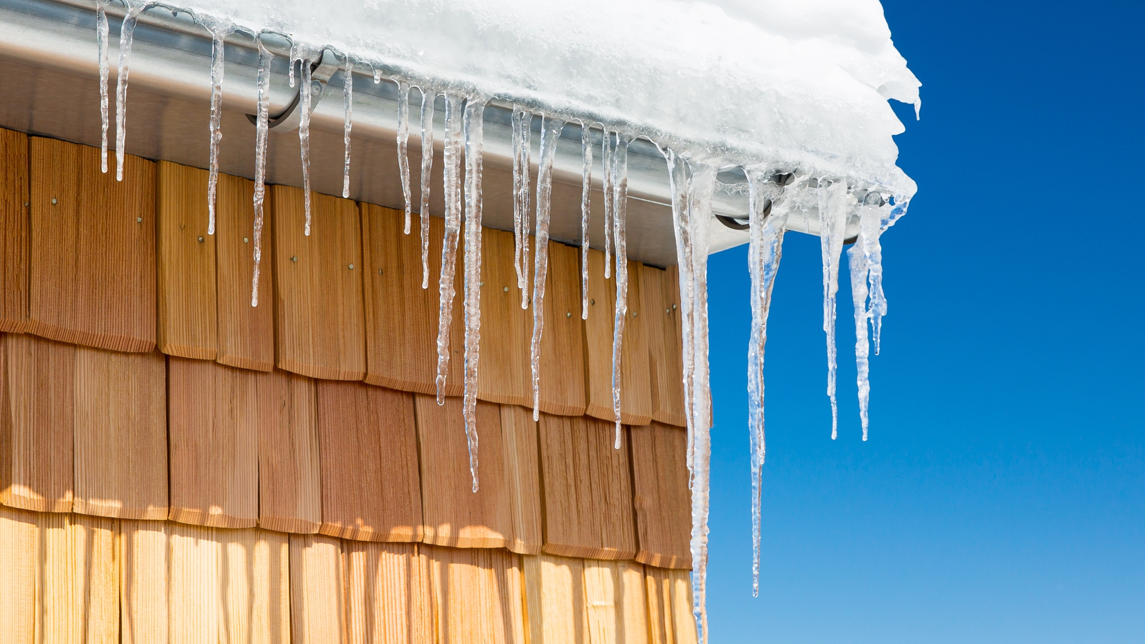 How To Prevent and Remove Ice Dams Gutter Masters